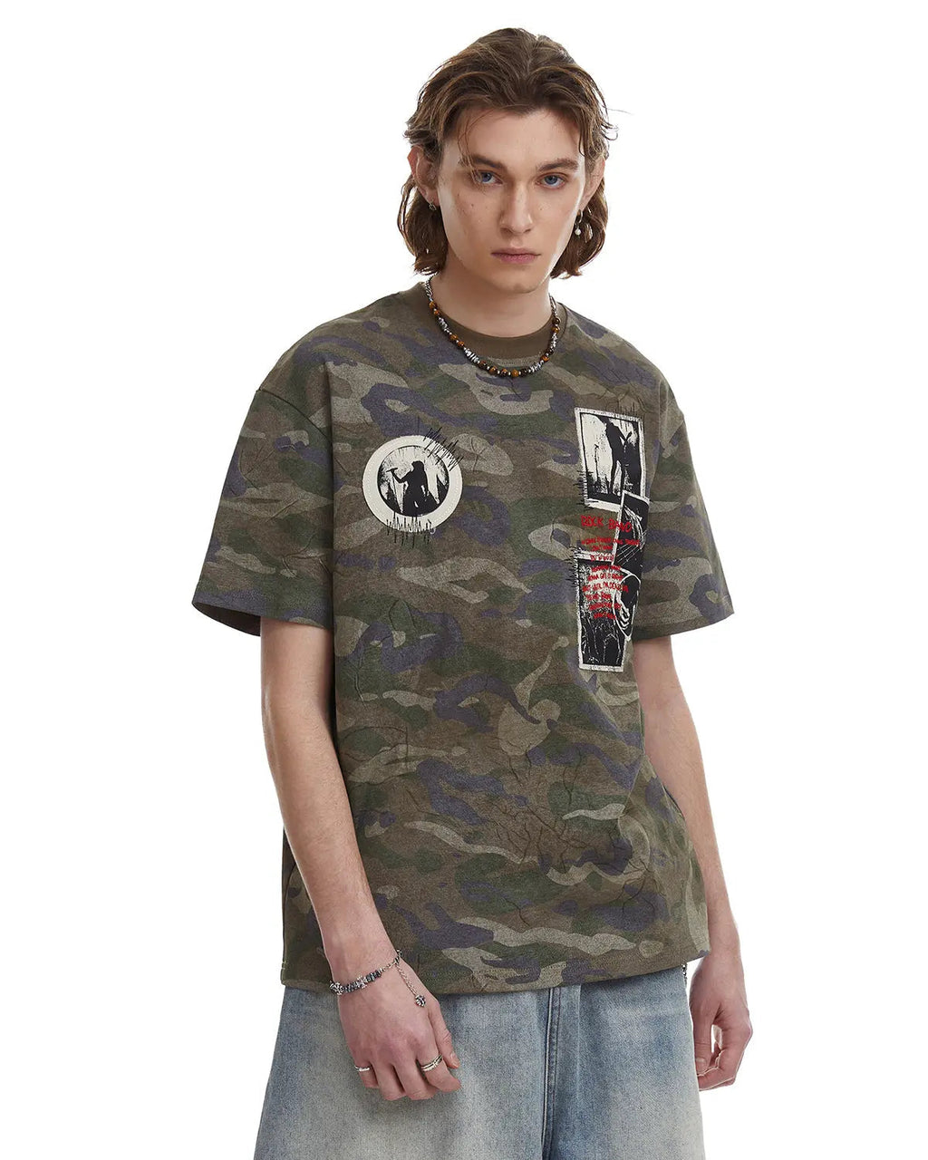 Vintage camo patch graphic T-shirt by INFLATION featuring a bold military-inspired design and streetwear style.