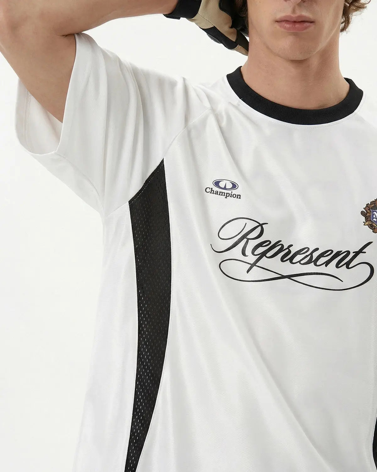 Retro colorblock football jersey by INFLATION featuring bold red, black, and white panels, styled for streetwear fashion.