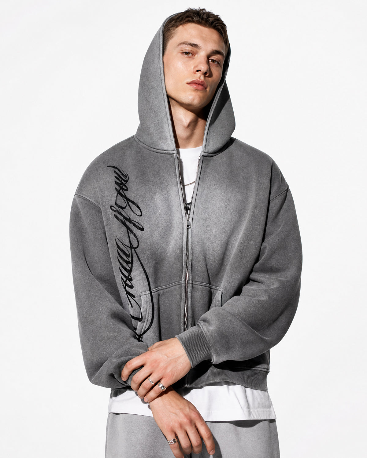 Acid wash zip-up hoodie by INFLATION featuring a casual fit, hood, and full front zipper in a streetwear style.