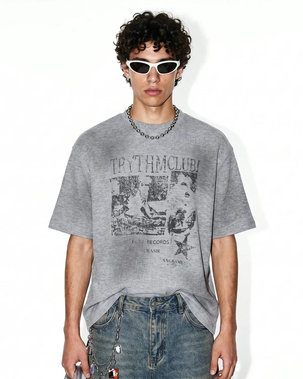 Inflation Streetwear distressed graphic waffle T-shirt featuring bold print and casual fit, styled with a relaxed, vintage look.