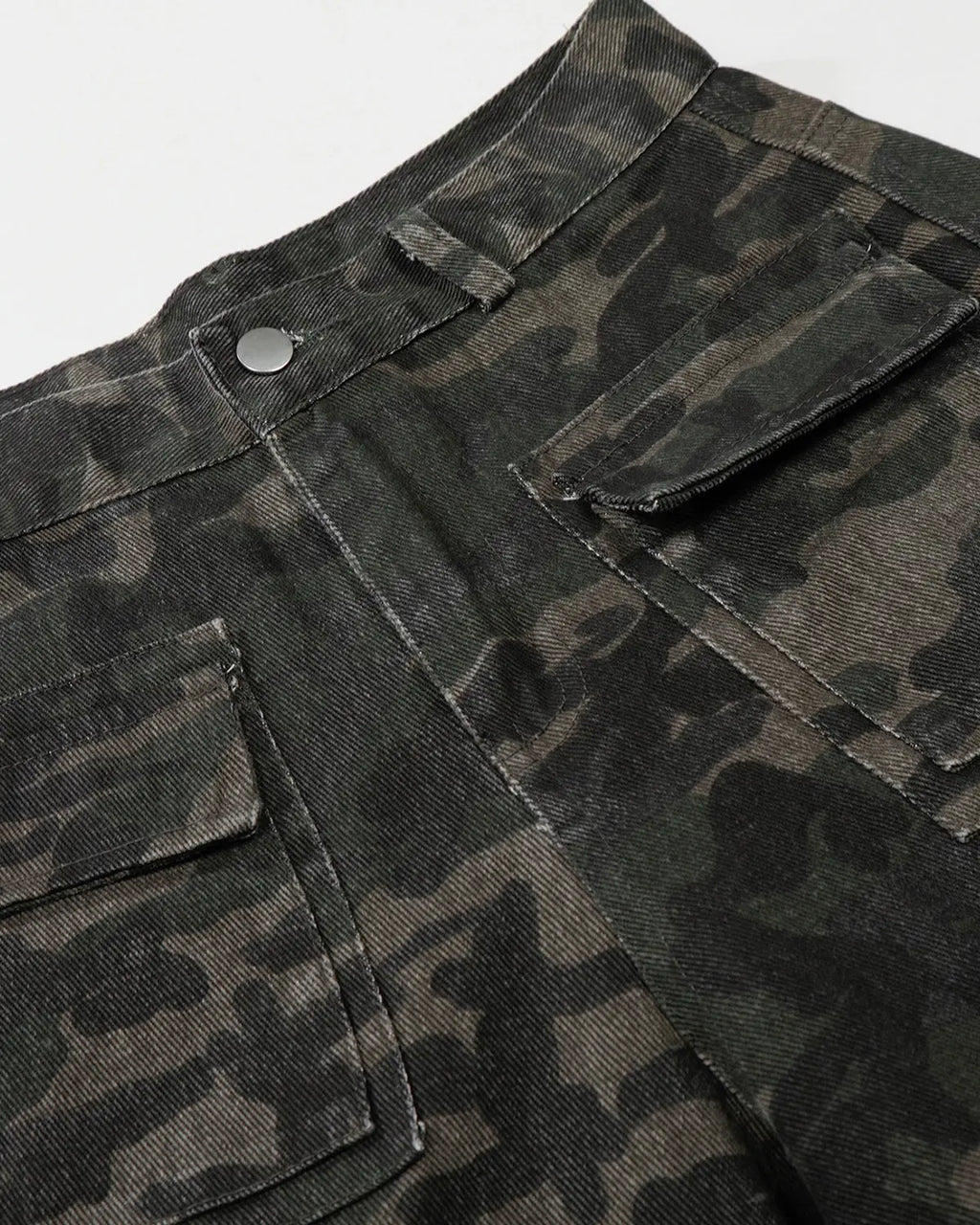 Inflation Streetwear multi pockets camo cargo pants with multiple side and back pockets in green camouflage fabric.