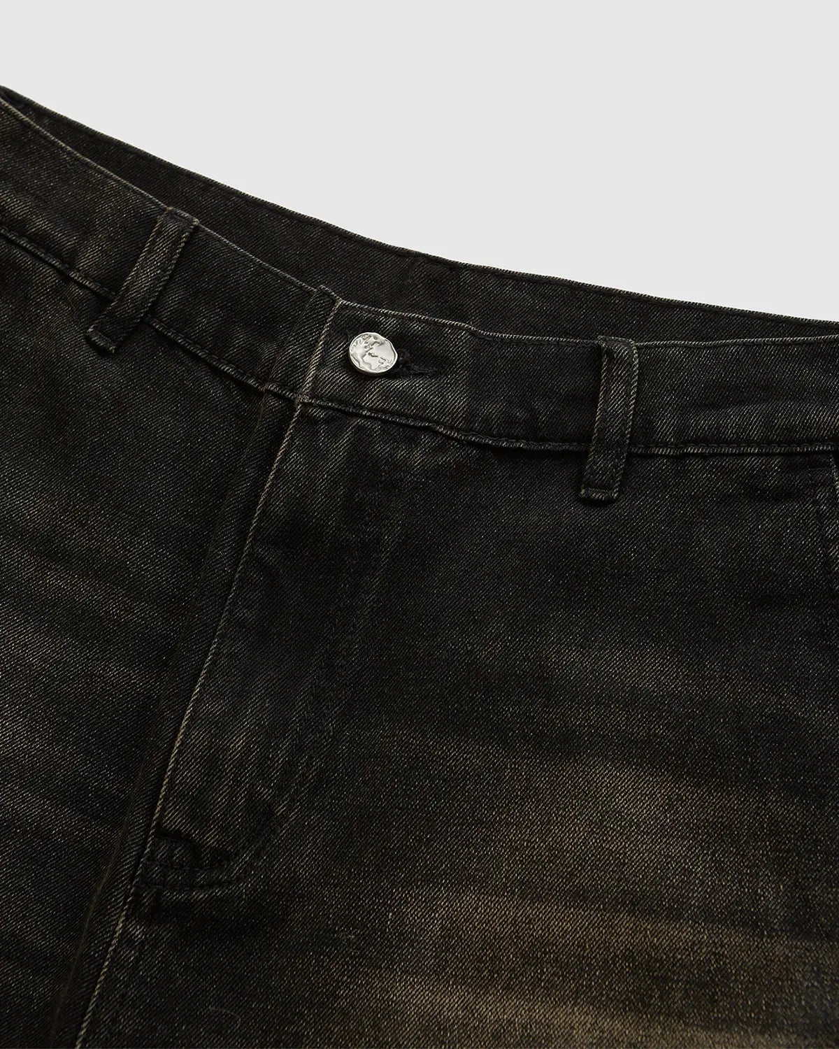Pair of retro washed INFLATION jeans styled as jorts with a distressed, vintage look, perfect for streetwear fashion.