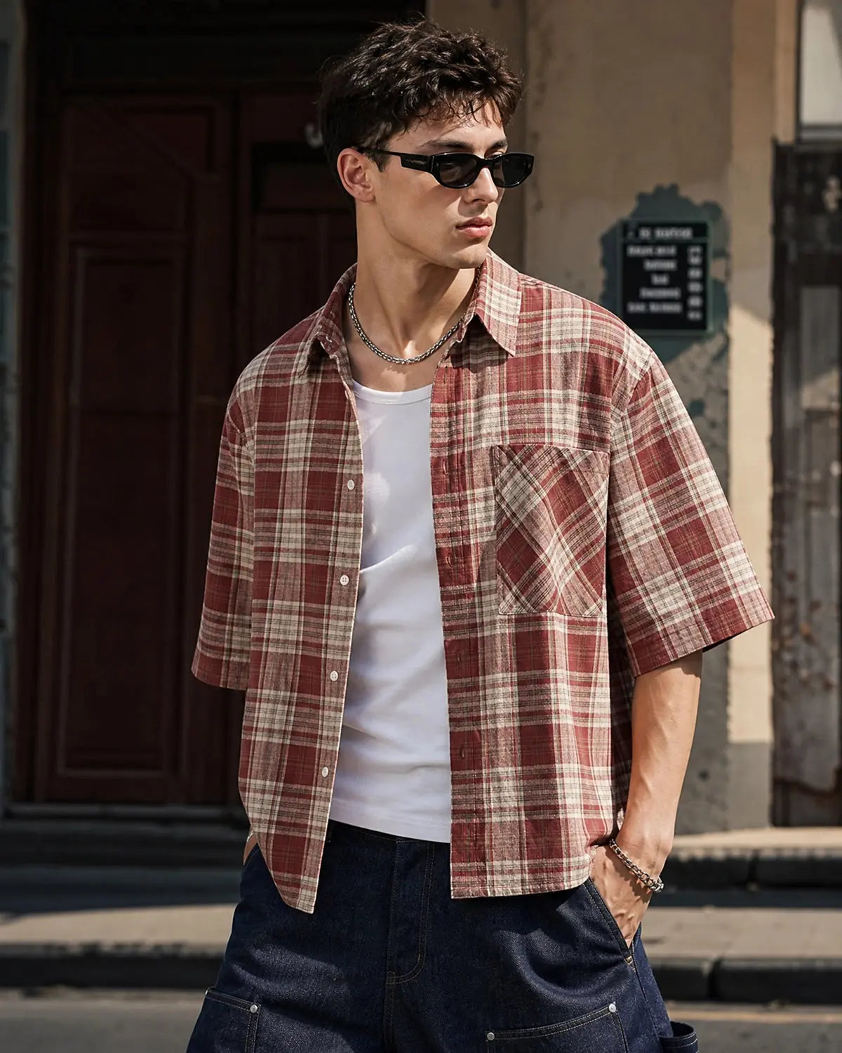 Inflation Streetwear boxy fit plaid shirt with a bold checkered pattern, featuring a button-up front and classic collar.