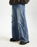 Blue frayed acid wash pants from Inflation Streetwear featuring distressed details and relaxed fit.