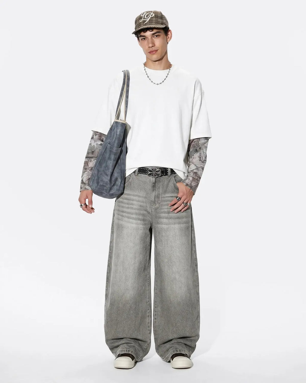 Inflation Streetwear camo layered oversized T-shirt featuring a relaxed fit and bold camouflage pattern on soft fabric.