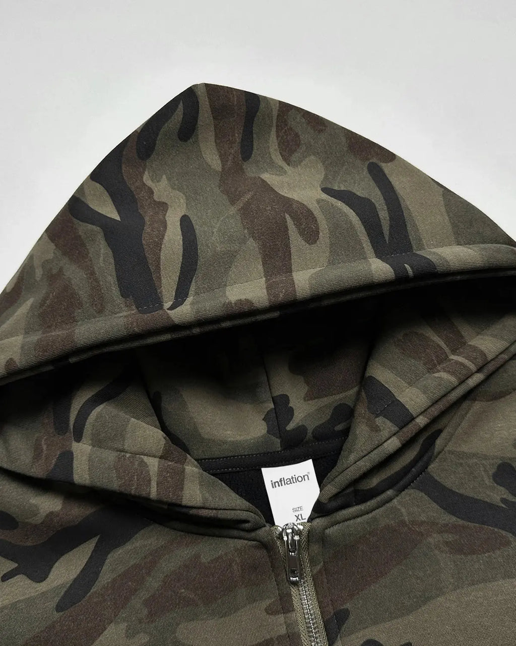 Inflation Streetwear 69 Applique Embroidery camo zip-up hoodie featuring bold applique design and adjustable hood.