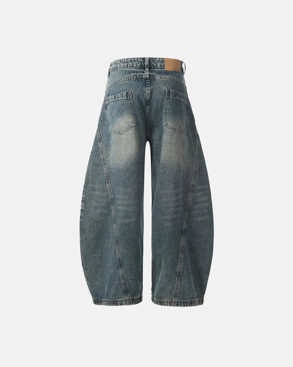 Distressed Supper Baggy Jeans by INFLATION featuring a loose fit, distressed details, and streetwear style, shown on a model.