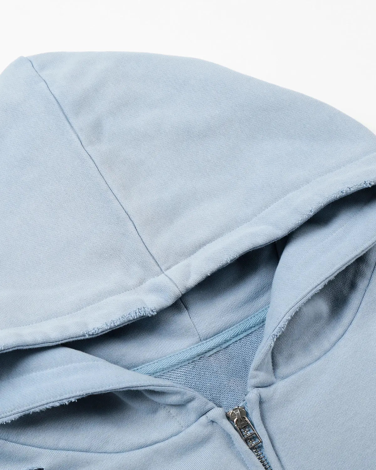Inflation streetwear graffiti character distressed washed zip hoodie with bold graphic design on front and faded denim fabric.