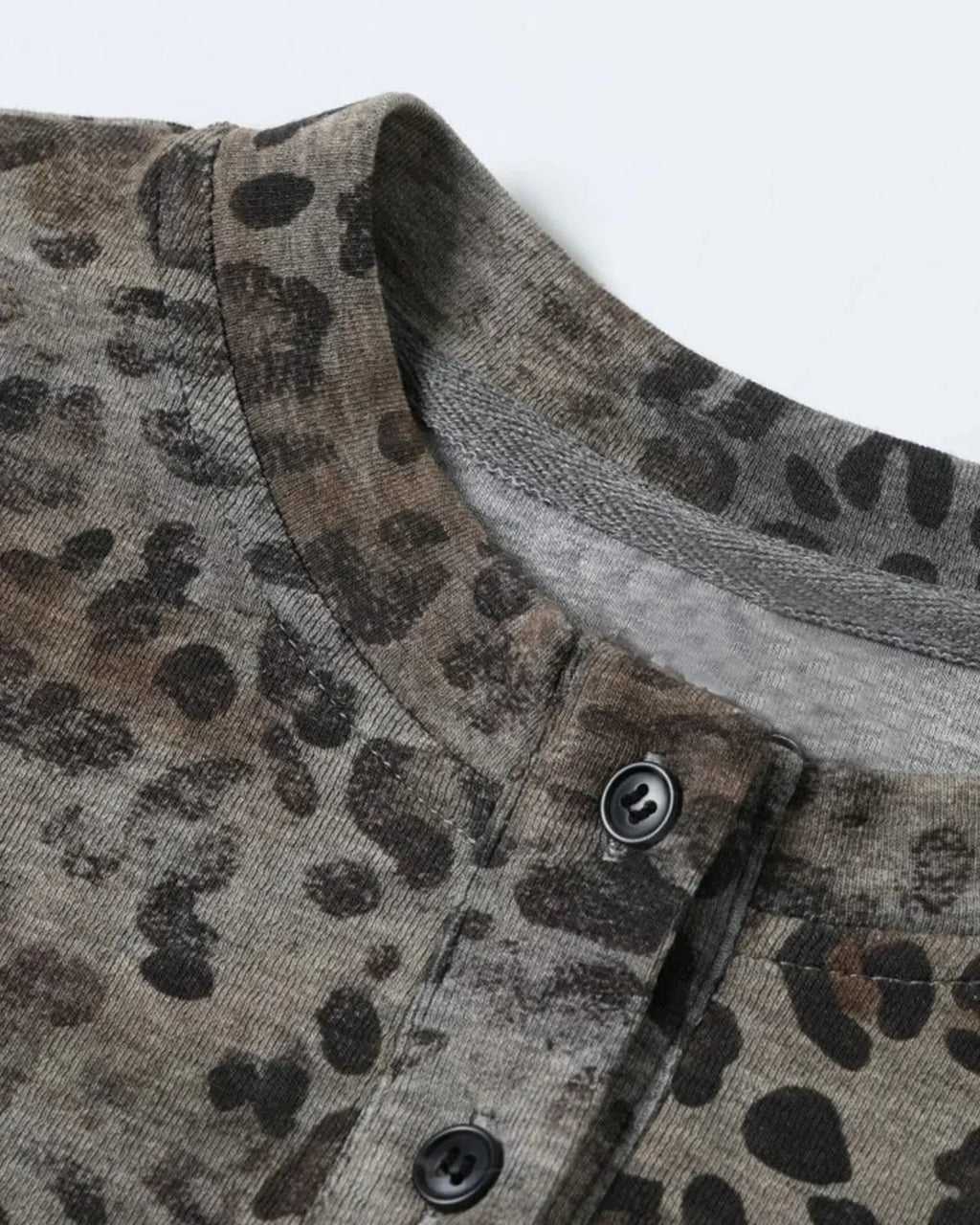 Leopard script Henley baby tee by INFLATION, featuring a cute leopard print design and comfortable fabric for infants.