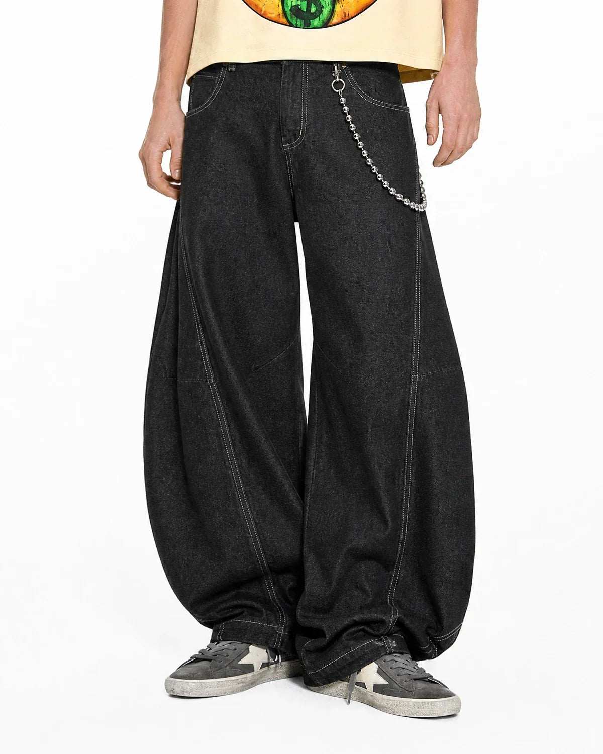 Raw Color Super Baggy Jeans by INFLATION featuring a loose fit, distressed denim, and streetwear style on a model.