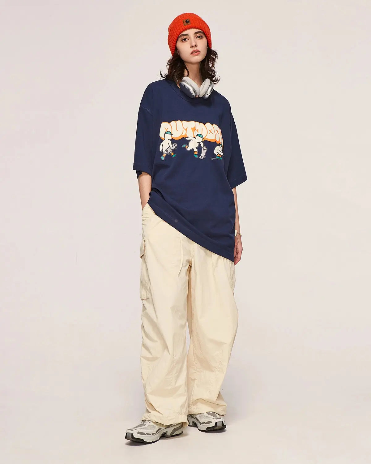 Inflation Classical Parachute Cargo Pants with multiple pockets and relaxed fit, styled with streetwear elements and durable fabric.