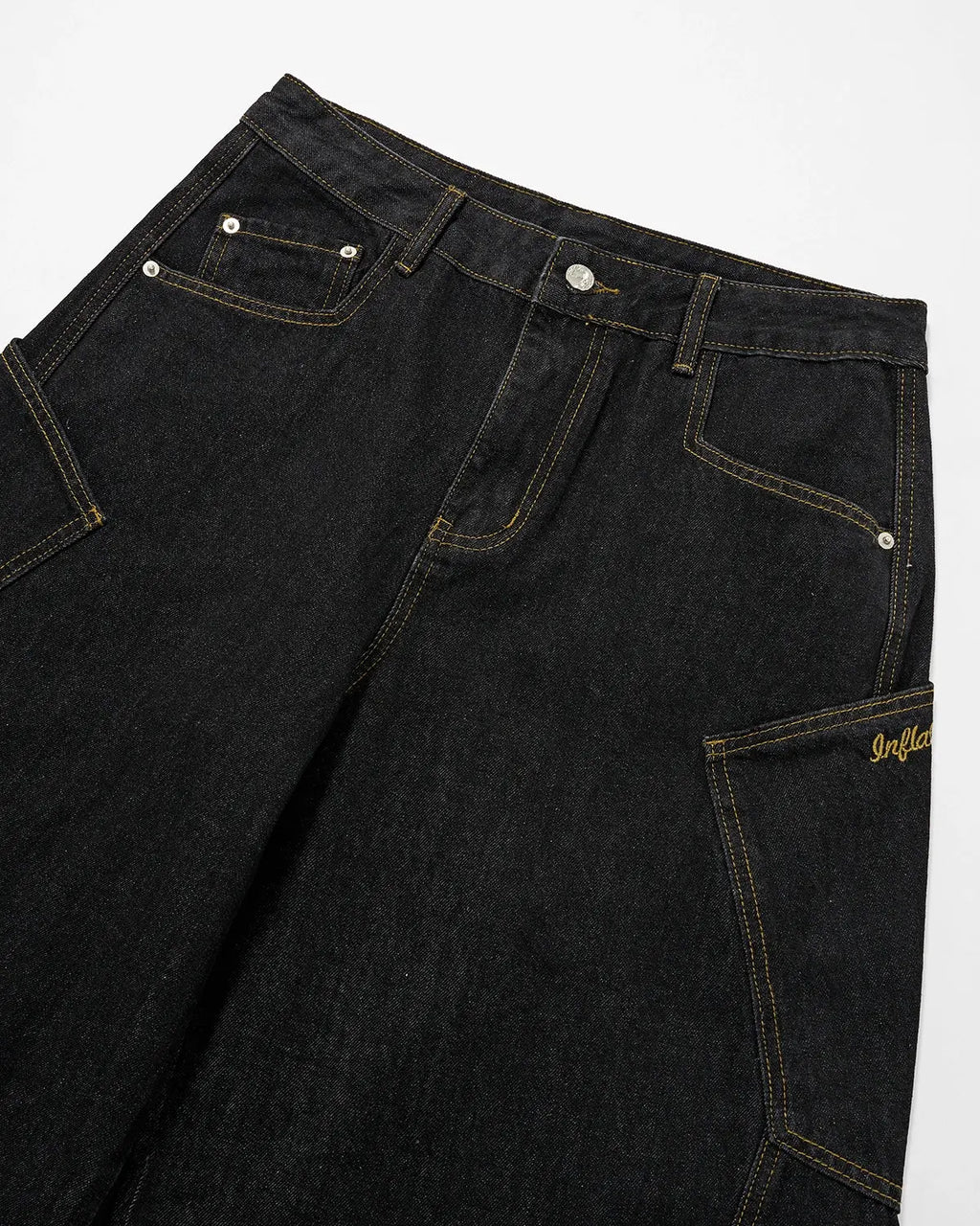 Inflation Super Raw Barrel Jeans showing distressed denim style, slim fit design, and raw hem details from the Inflation streetwear collection.