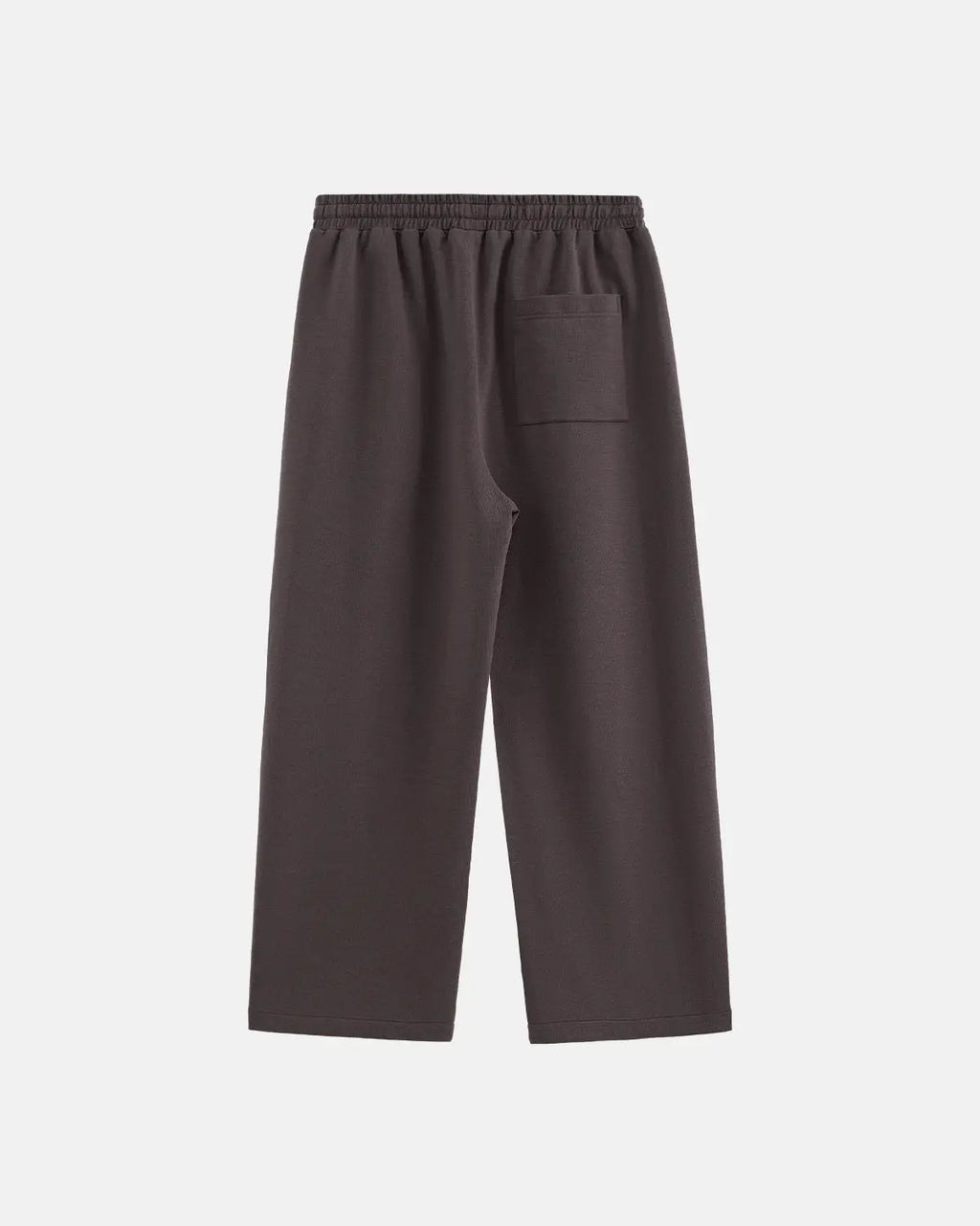 Skin-friendly black inflation streetwear sweatpants with elastic waistband and relaxed fit, made for comfortable casual wear.