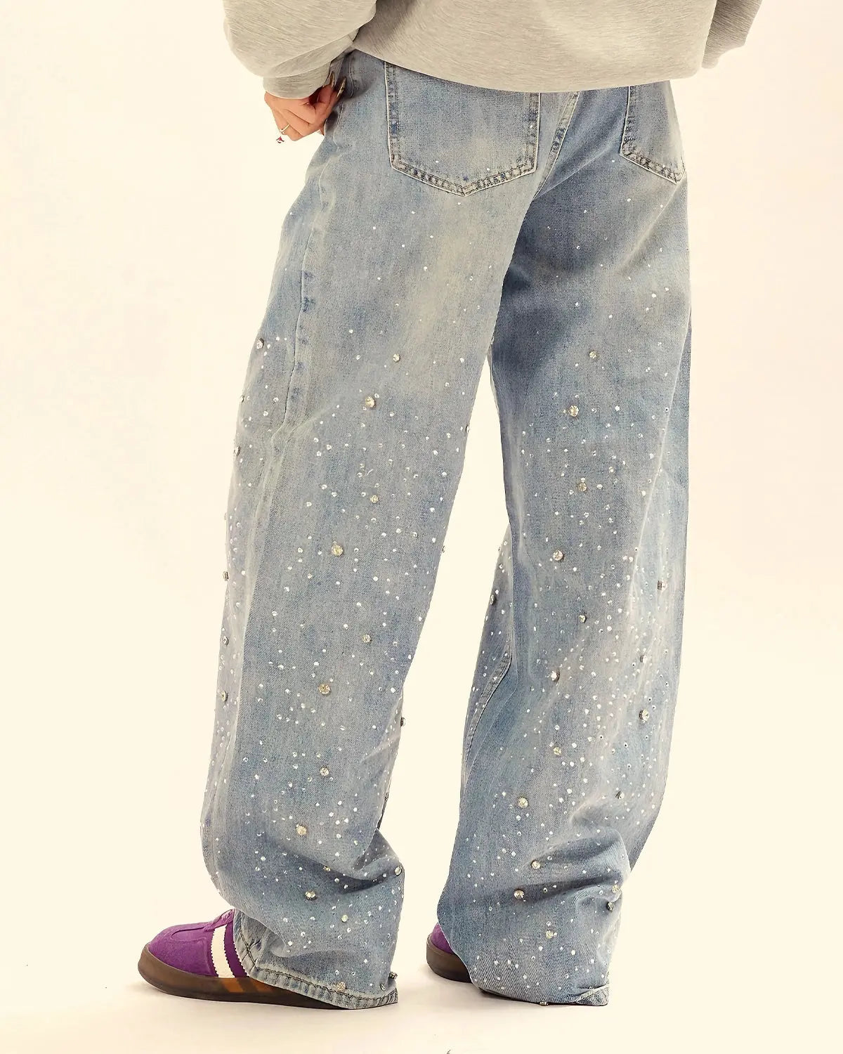 Inflation Studded Rhinestone Baggy Jeans featuring rhinestone embellishments and a relaxed streetwear fit.