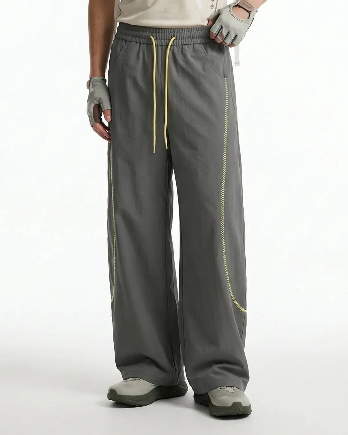Black AirFlow Contrast Embroidered Track Pants by INFLATION with sleek design and contrast embroidery detail.