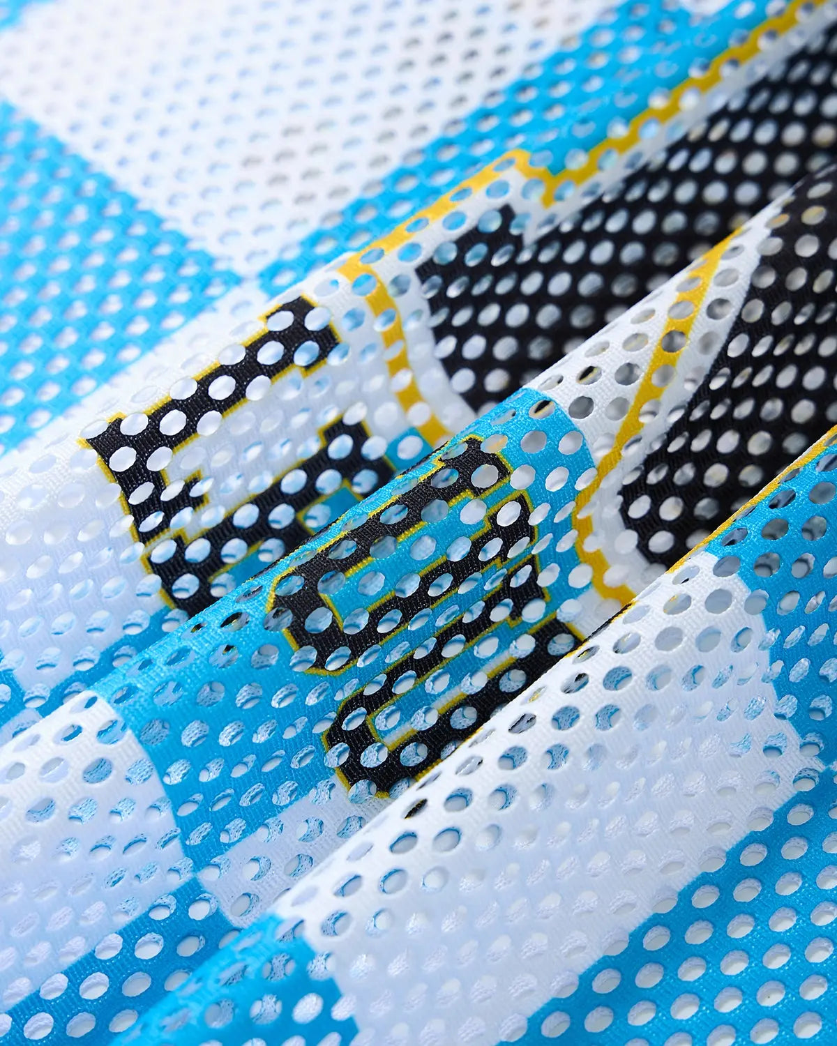 Inflation Streetwear varsity checkerboard mesh jersey with black and white pattern and team-inspired design.