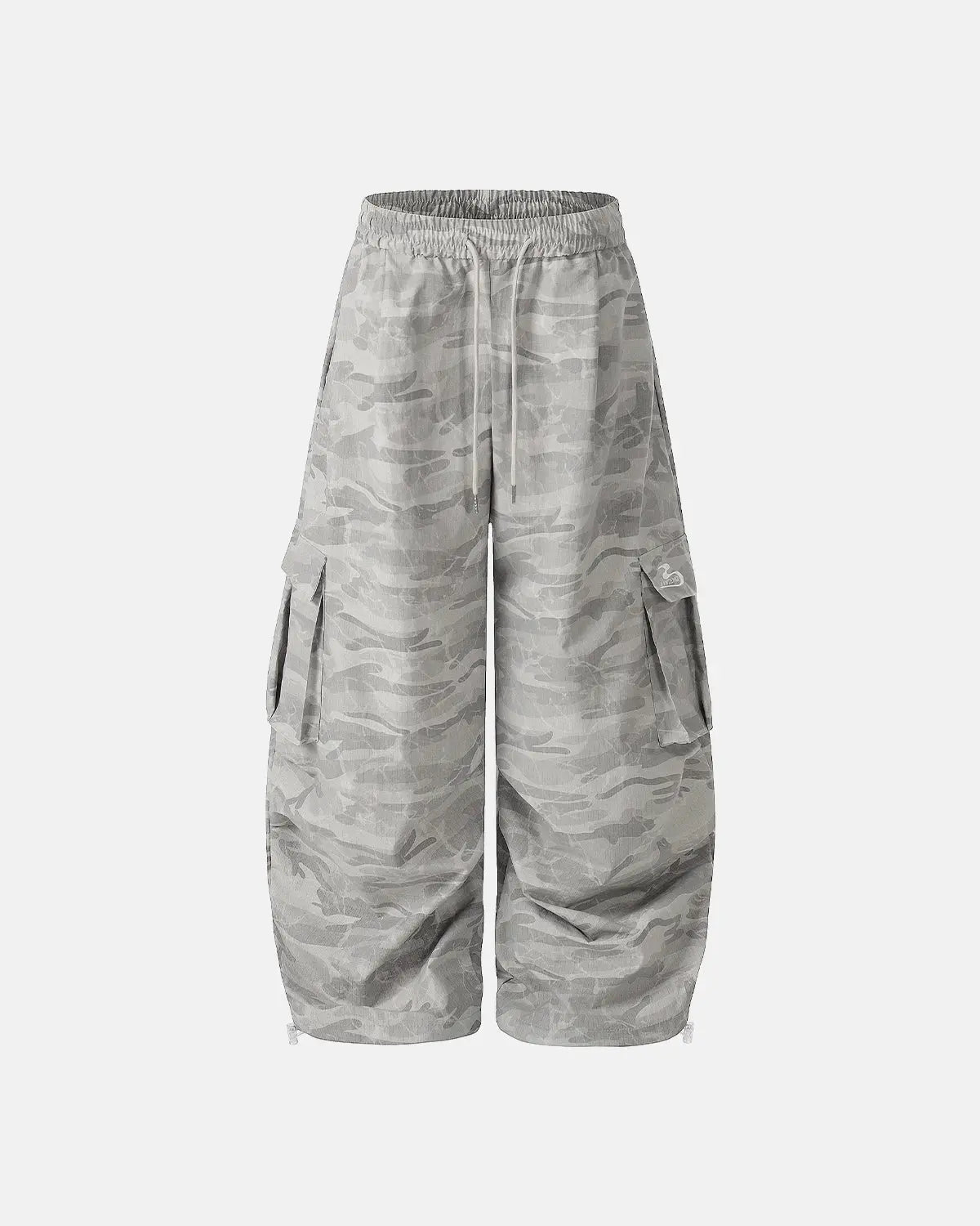 Camouflage cargo barrel pants in green and beige by INFLATION, featuring multiple pockets and relaxed streetwear style.