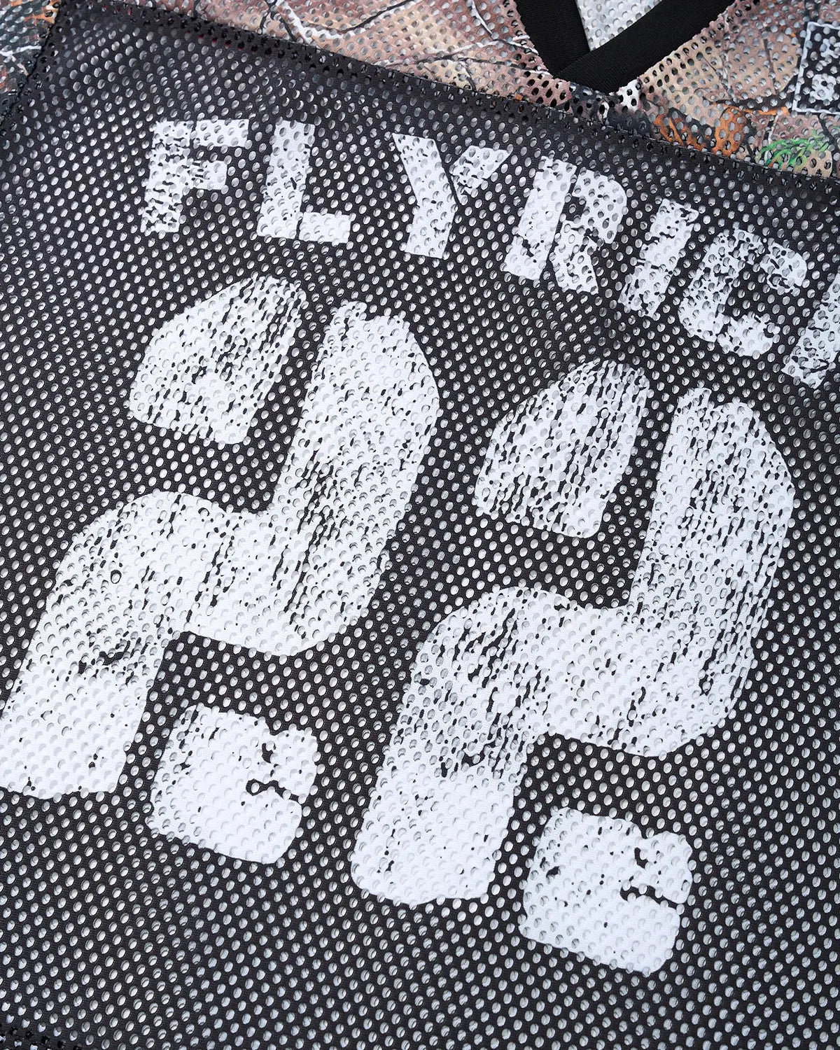 Inflation Streetwear camo mesh digital print jersey tee showing a stylish camouflage pattern on lightweight fabric.