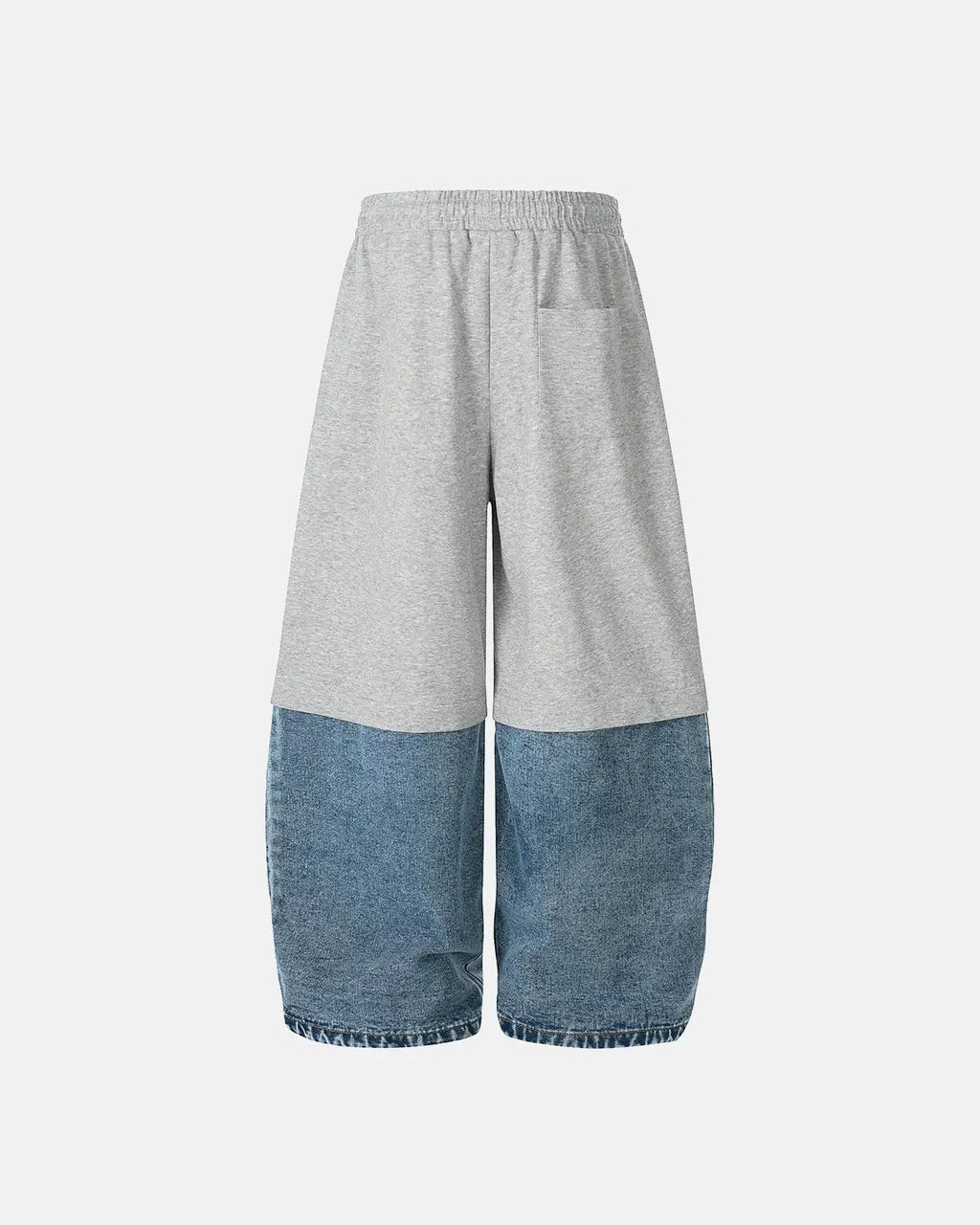 Denim detachable patchwork barrel joggers by INFLATION, showing stylish patchwork design and relaxed fit on the denim fabric.