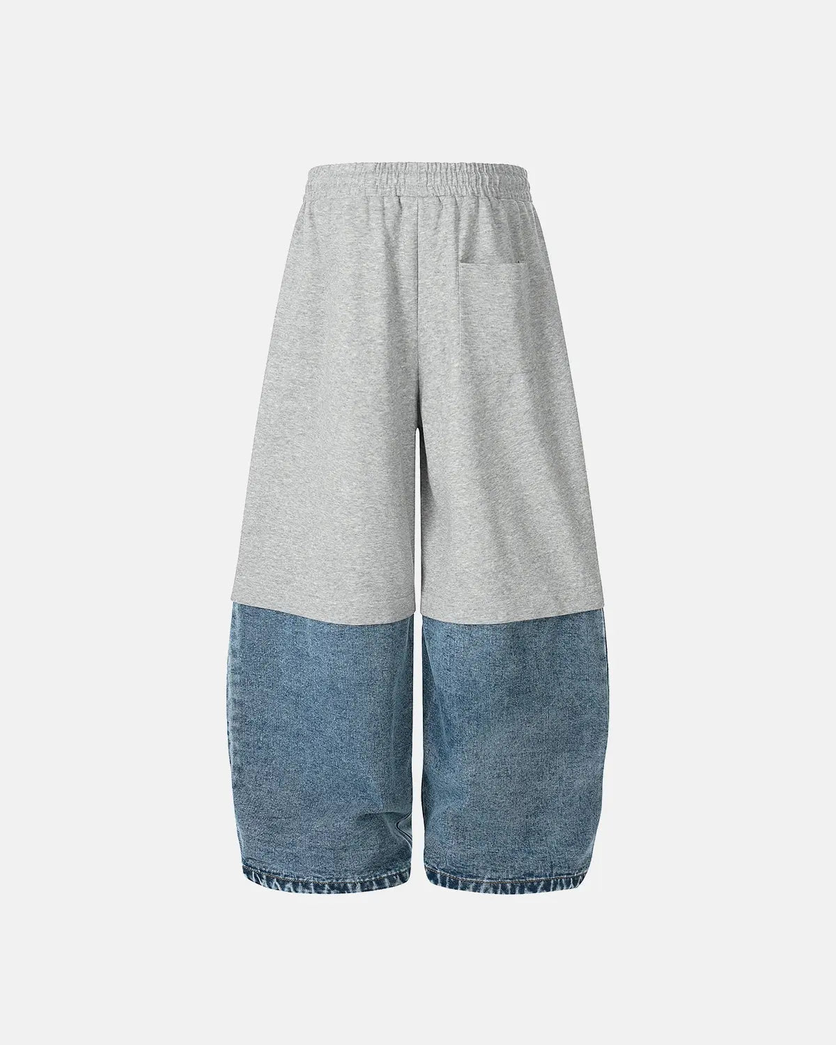 Denim detachable patchwork barrel joggers by INFLATION, showing stylish patchwork design and relaxed fit on the denim fabric.