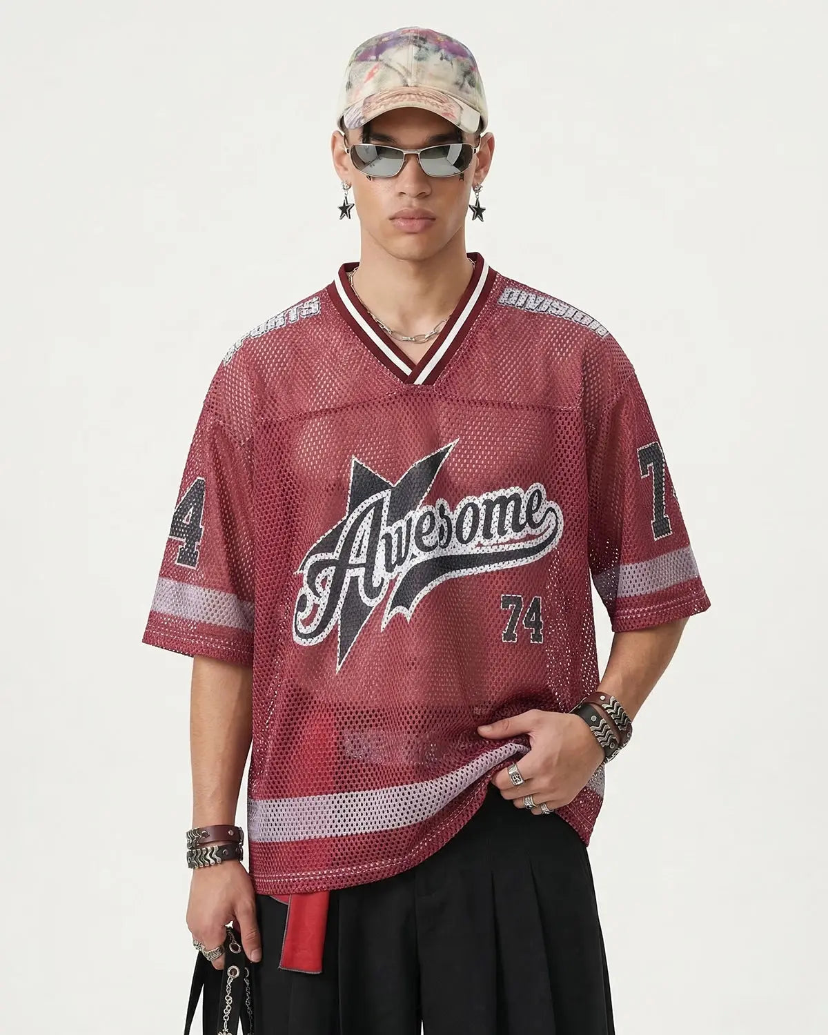 V-neck graphic mesh jersey by INFLATION featuring bold streetwear style and breathable mesh fabric.