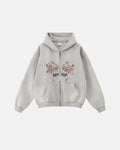 Inflation washed graphic zip-up hoodie showing a stylish design on the front, with a comfortable fit and casual streetwear style.