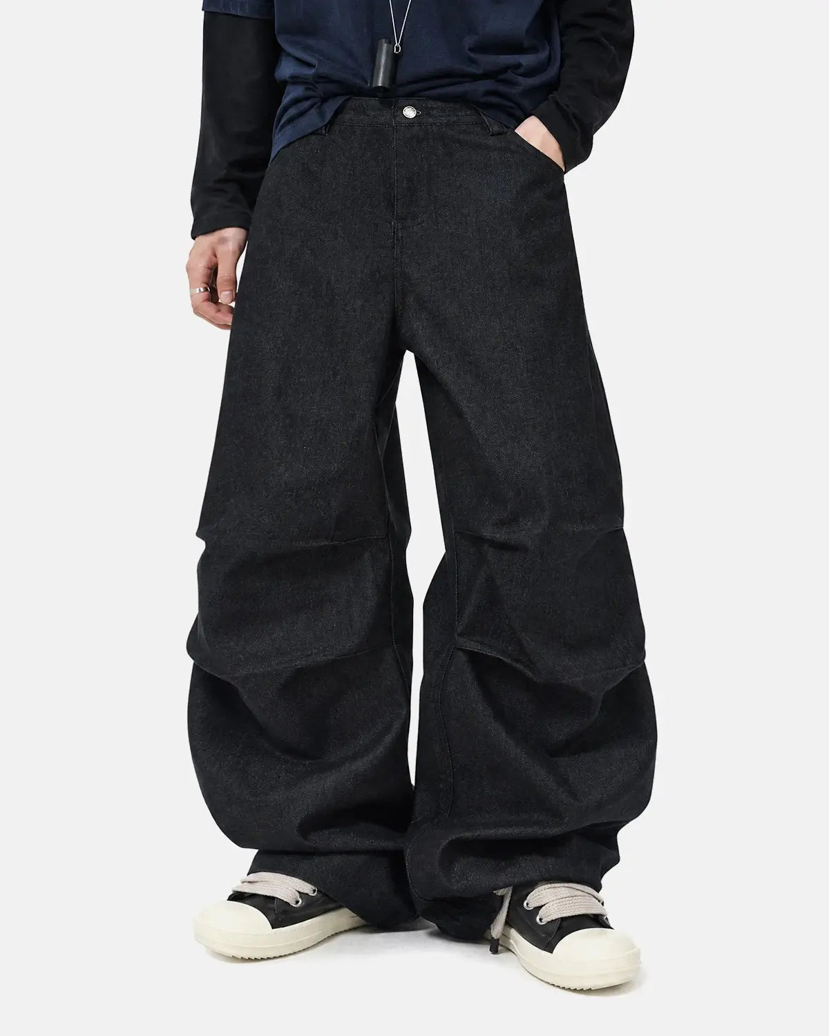 Inflation Super Raw Baggy Jeans with distressed details, relaxed fit, and casual streetwear style, shown in a light denim wash.