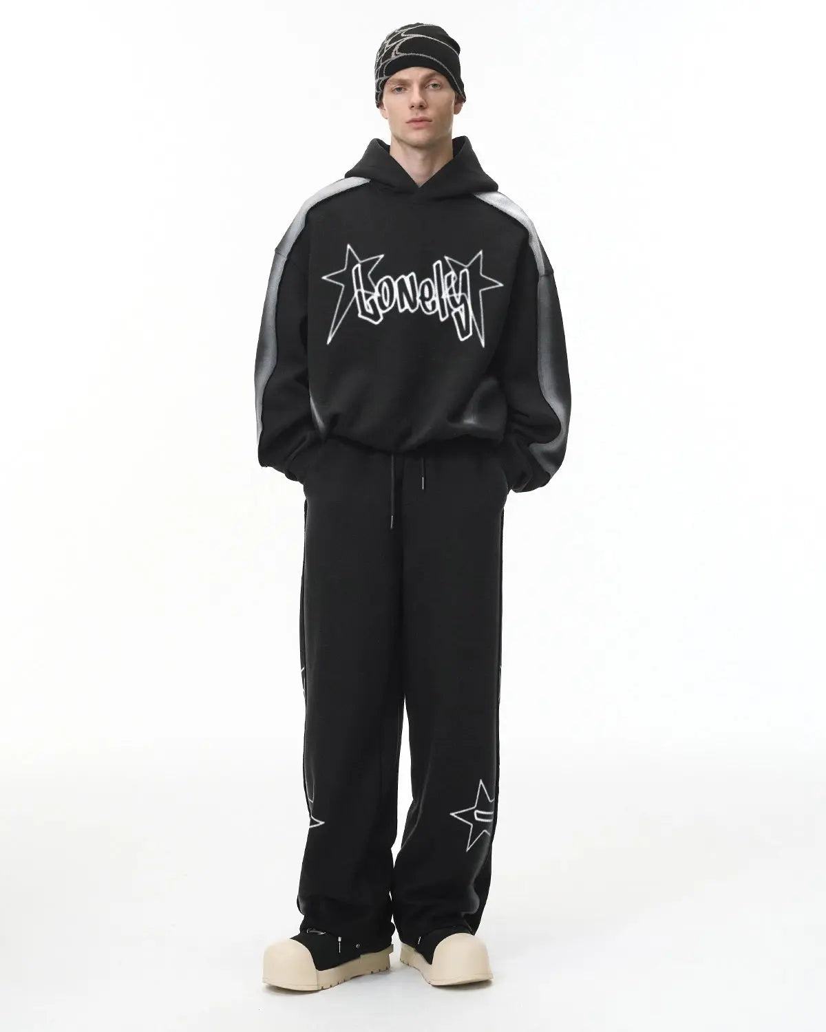 Inflation Streetwear stitching spray-painted graffiti sweatpants with colorful abstract designs and comfortable fit.