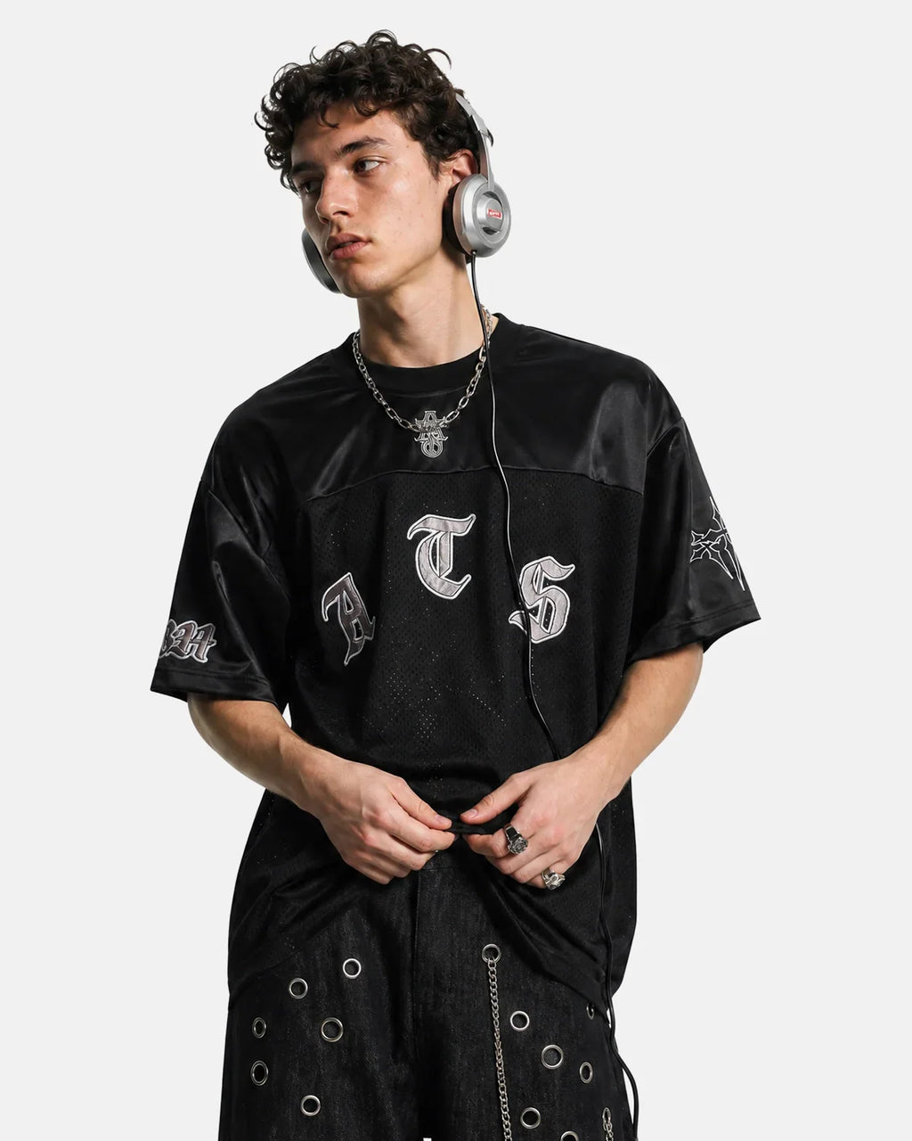 Black gothic embroidered mesh T-shirt by INFLATION with intricate embroidery and lightweight sheer fabric for edgy streetwear style