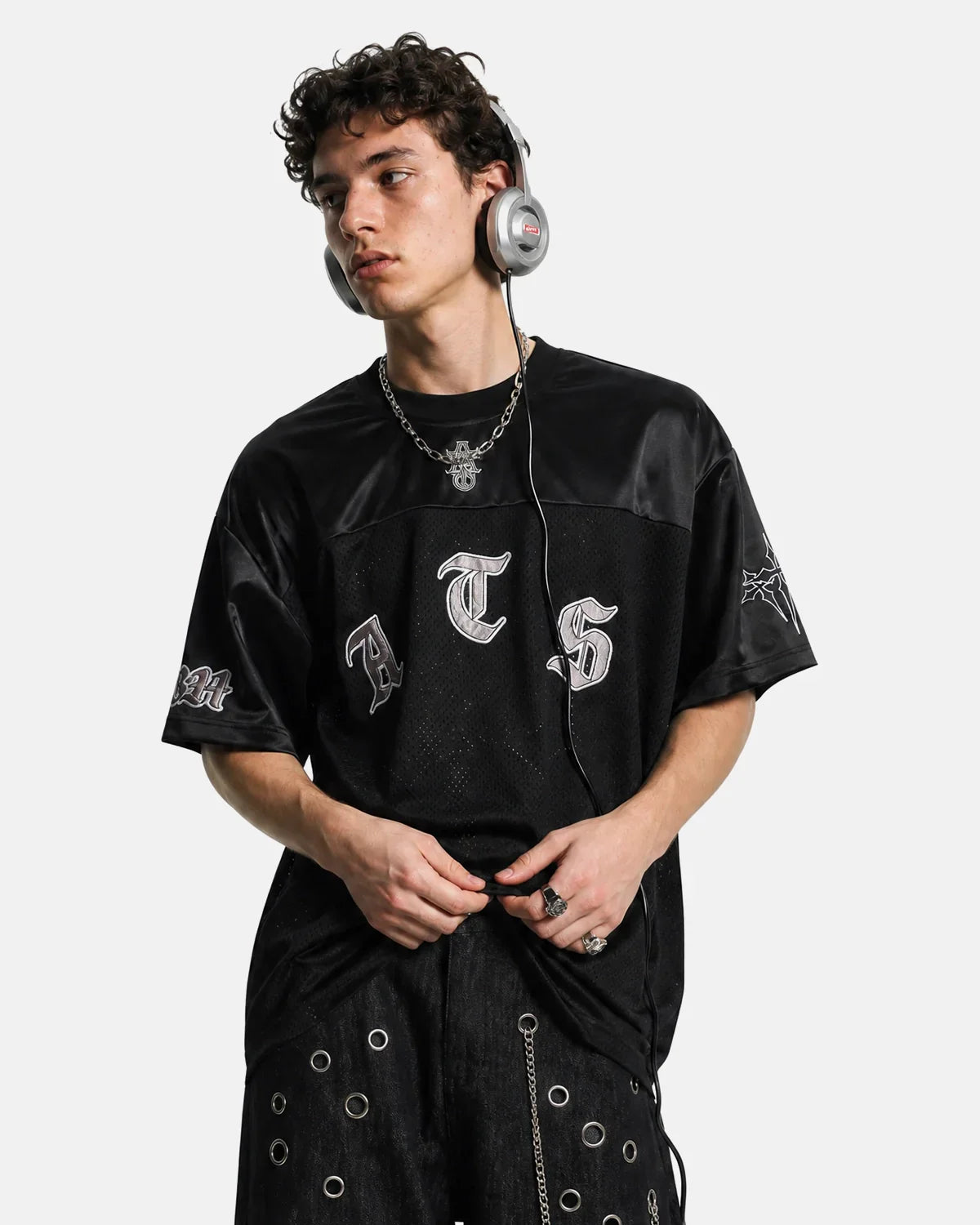 Black gothic embroidered mesh T-shirt by INFLATION with intricate embroidery and lightweight sheer fabric for edgy streetwear style