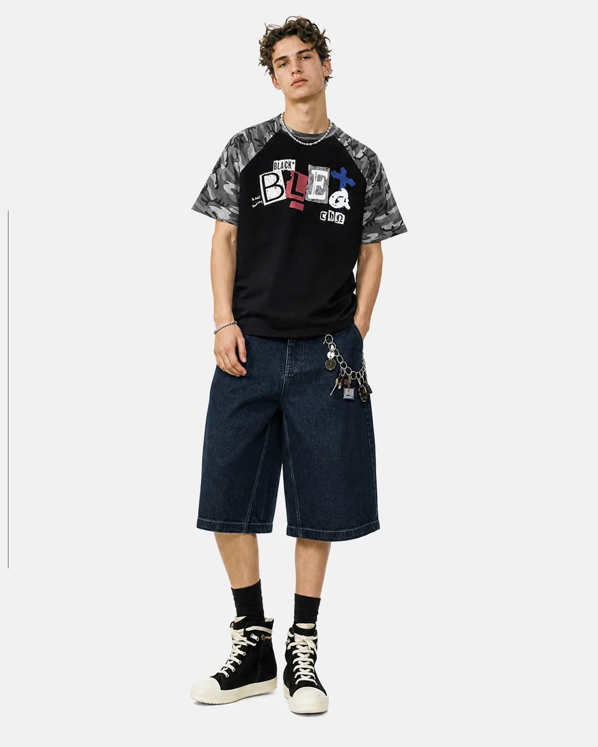 Inflation Streetwear camo sleeve graphic boxy T-shirt featuring bold camouflage pattern and relaxed fit, casual streetwear style.