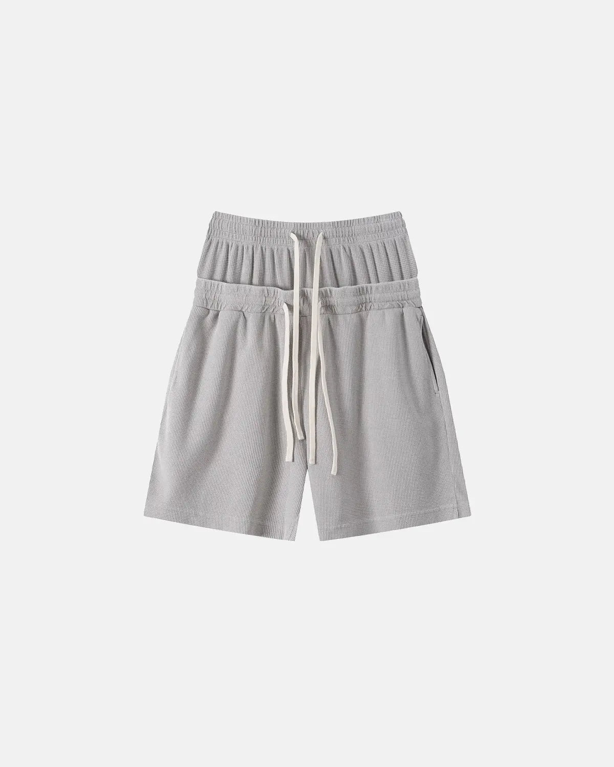 Inflation streetwear double waist acid wash waffle shorts, casual men's pants with a relaxed fit and textured fabric.