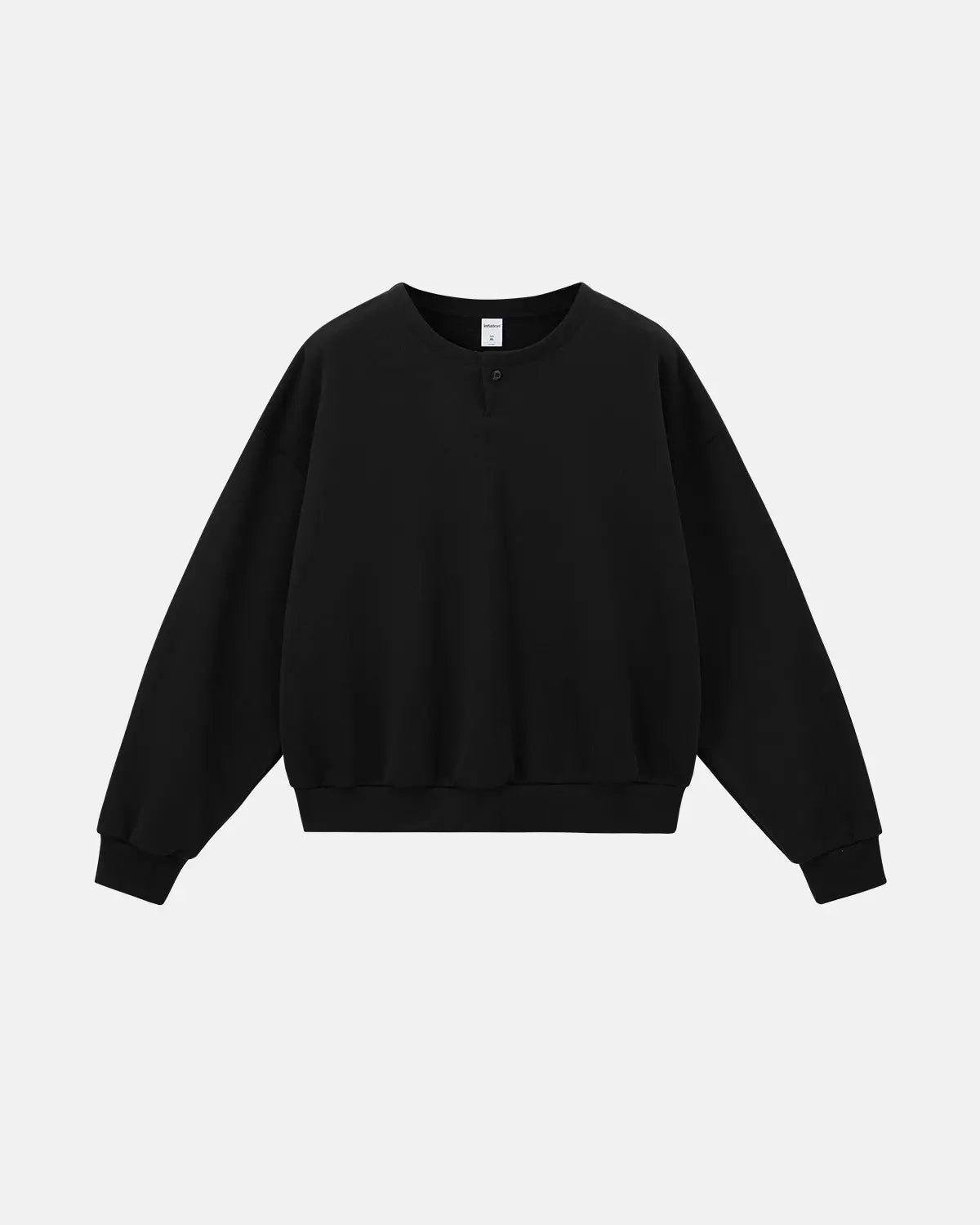 Inflation Streetwear boxy fit henley collar sweatshirt in neutral color, featuring a relaxed silhouette and buttoned neckline.