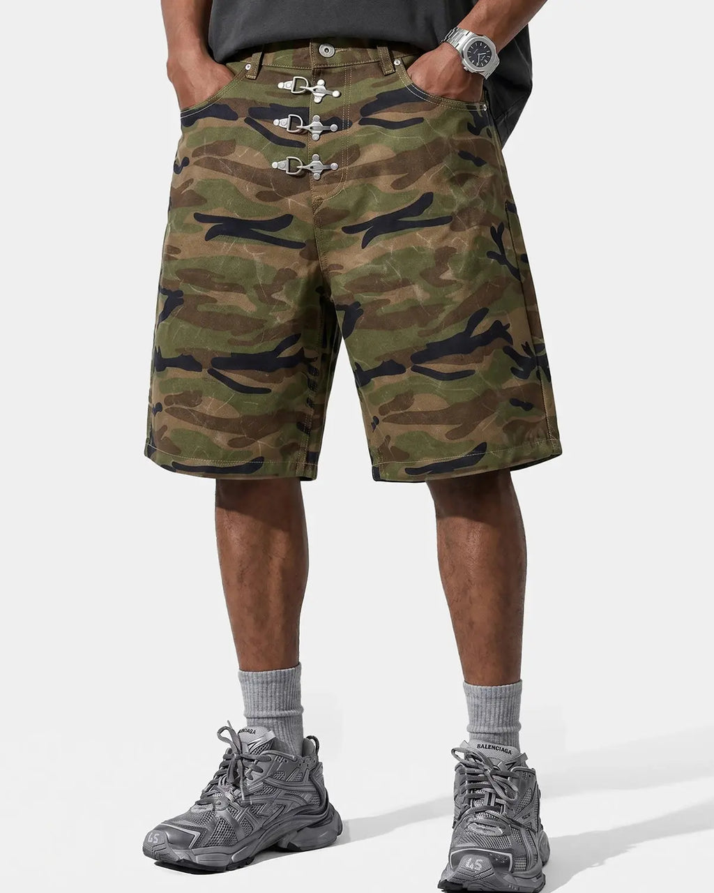 Inflation Streetwear metal clasp camo shorts, stylish pants with metallic clasp detail, featuring a camouflage pattern and casual fit.