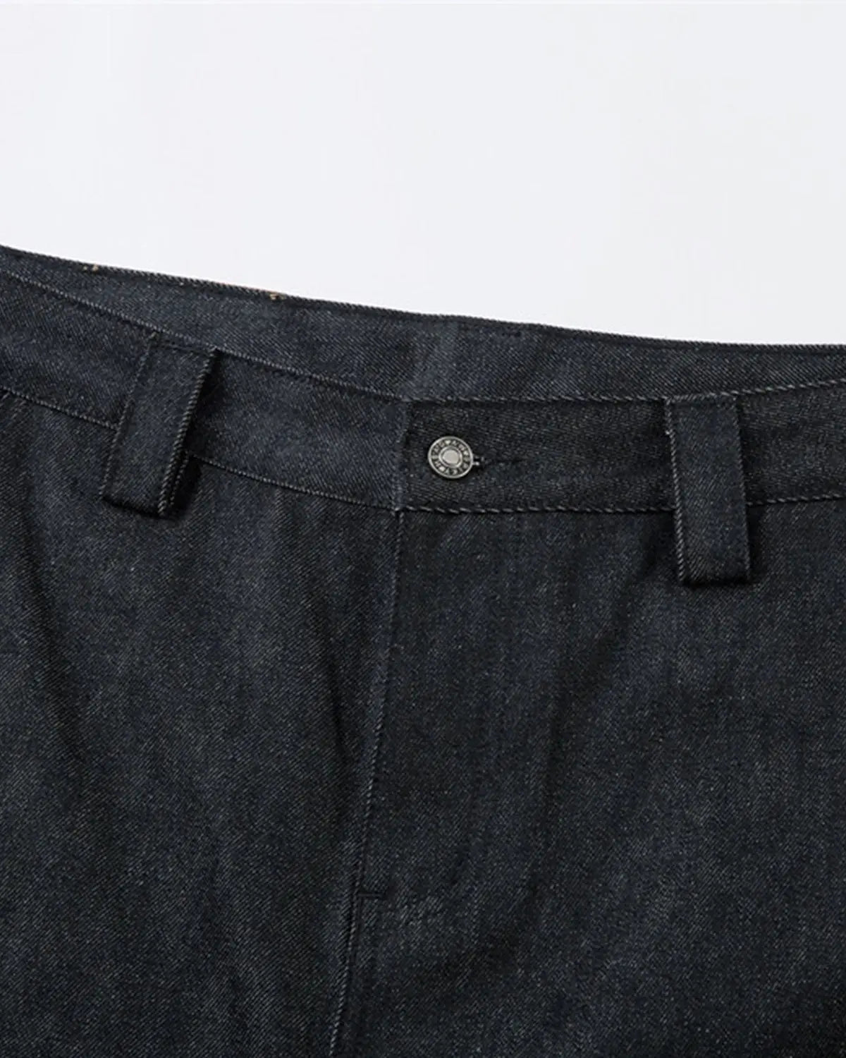 Inflation Super Raw Baggy Jeans featuring a loose fit, denim fabric, and streetwear style with distressed details.