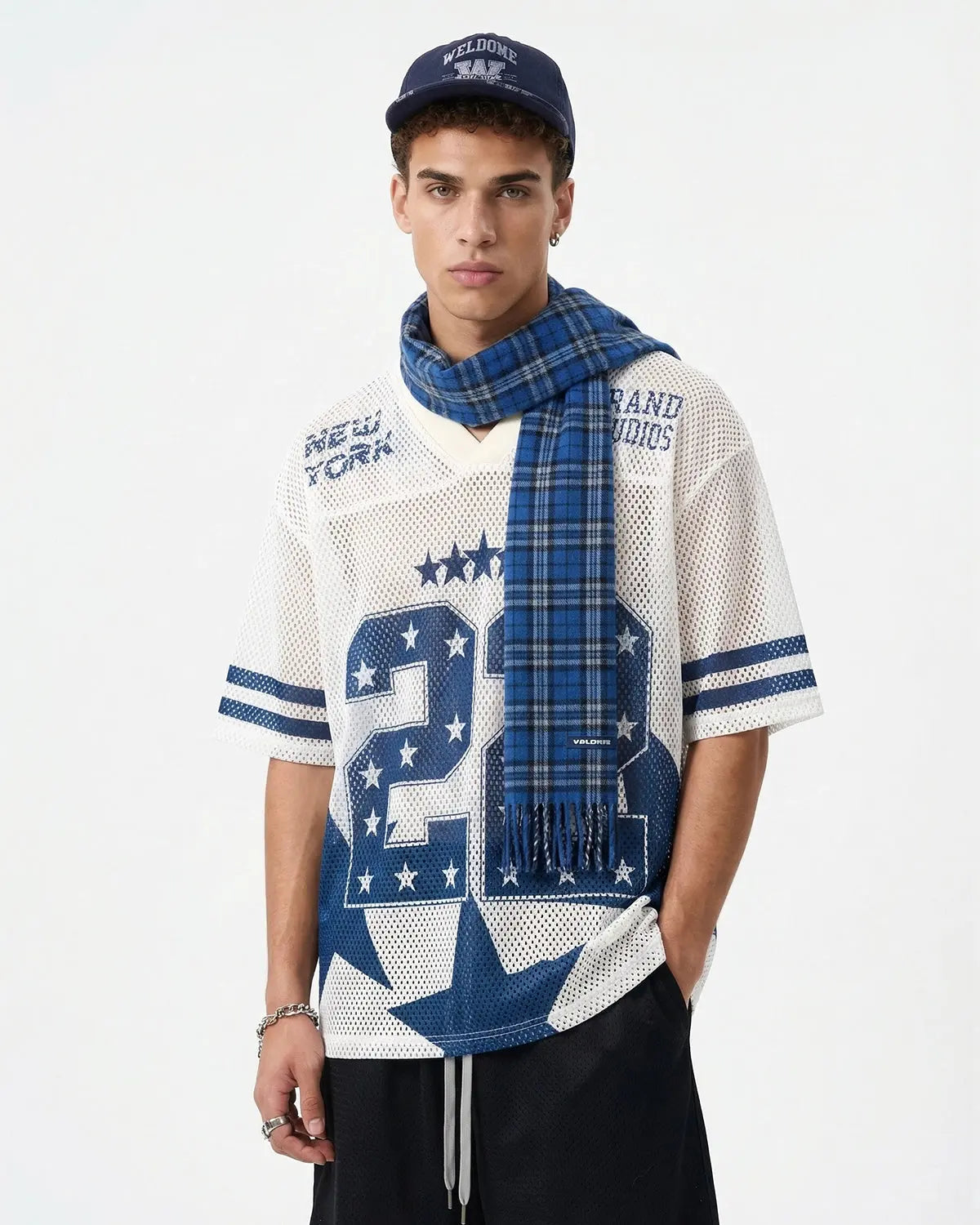 Star graphic oversized mesh jersey by INFLATION featuring a bold star design and breathable mesh fabric for streetwear style.