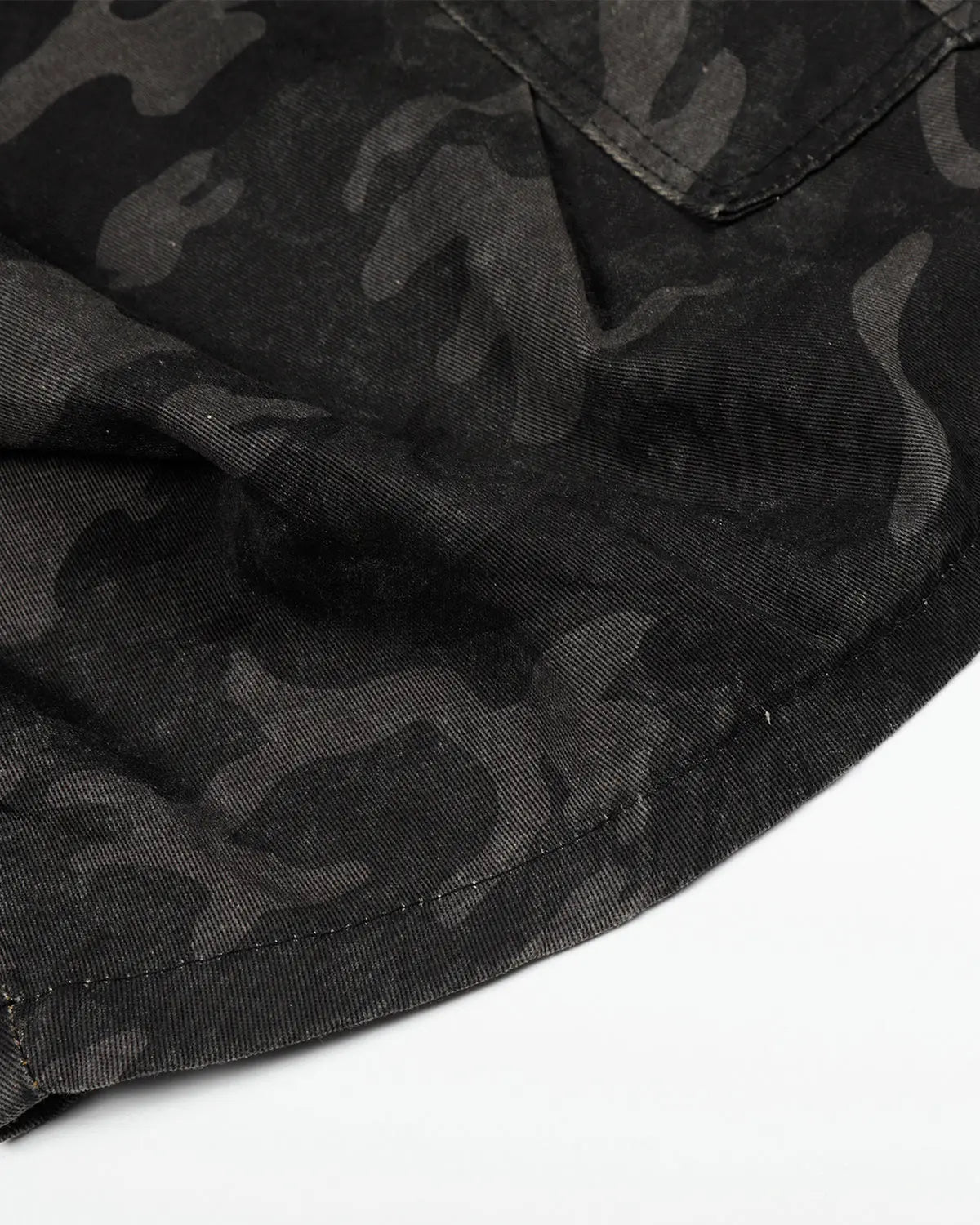 Dark camo cargo shorts by INFLATION, stylish streetwear pants with multiple pockets and a relaxed fit for casual wear.