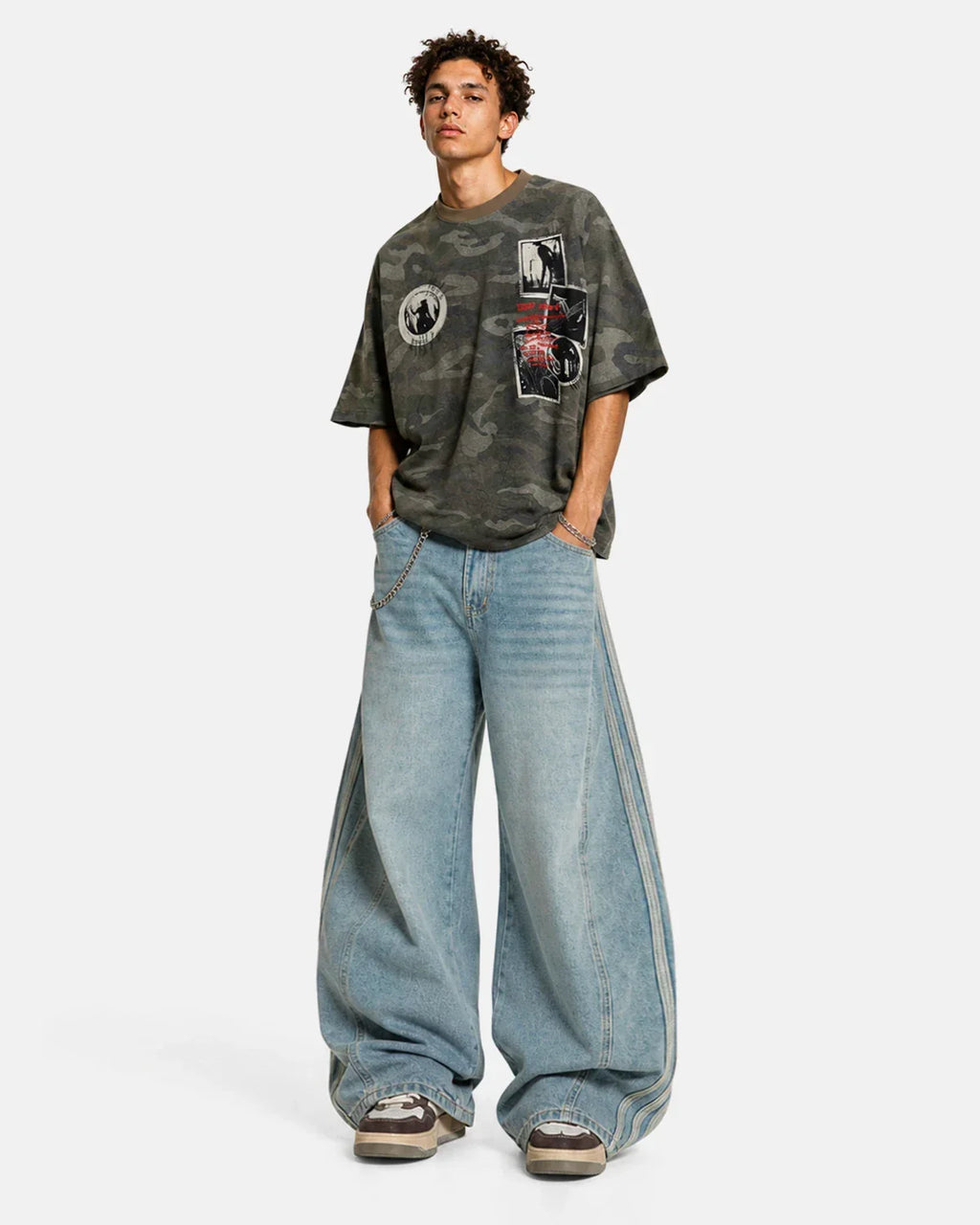 Acid wash striped side baggy jeans by INFLATION featuring relaxed fit, distressed details, and bold streetwear style.