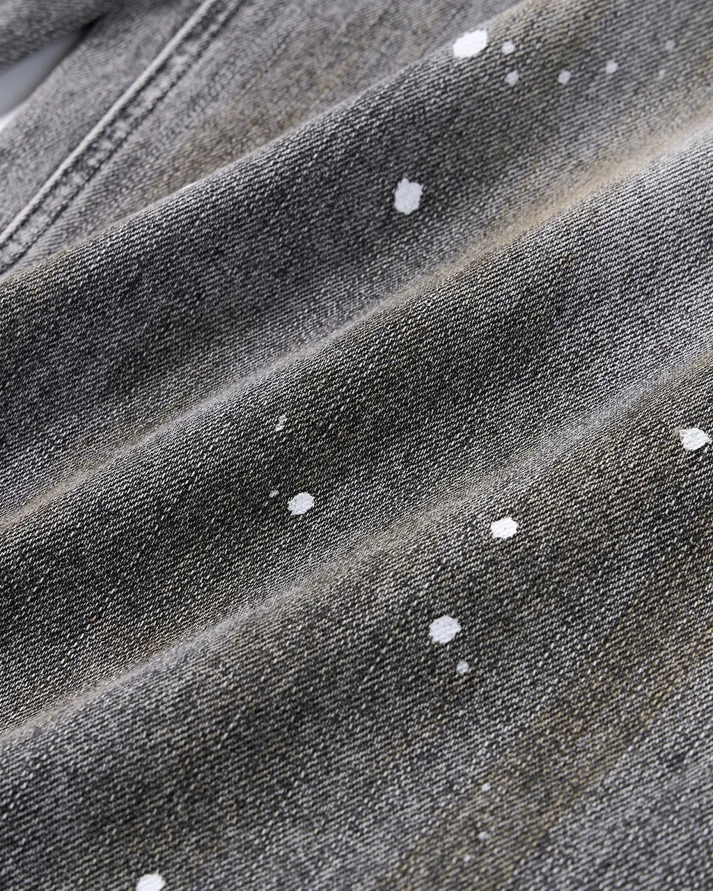 Inflation Streetwear washed barrel jeans with metal clasp, featuring a relaxed fit and distressed denim style.