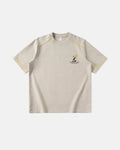 Inflation Streetwear contrast stitching graphic tee featuring bold print and colorful details on a casual cotton t-shirt.
