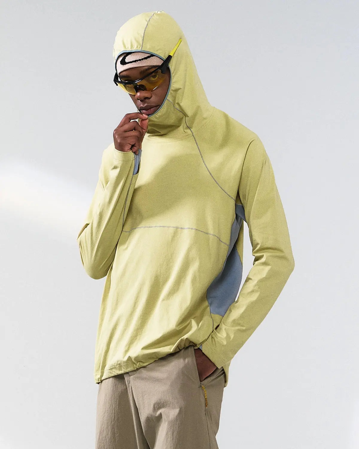 Inflation COOLMAX breathable hooded tee in black, featuring a relaxed fit and stylish streetwear design with a hood and short sleeves.