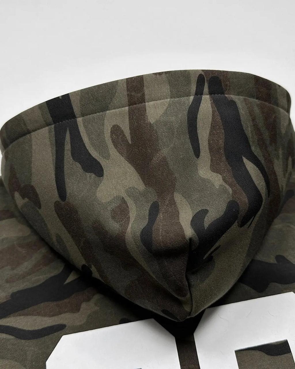 Inflation Streetwear 69 applique embroidery camo zip-up hoodie, featuring bold patch design and casual streetwear style.