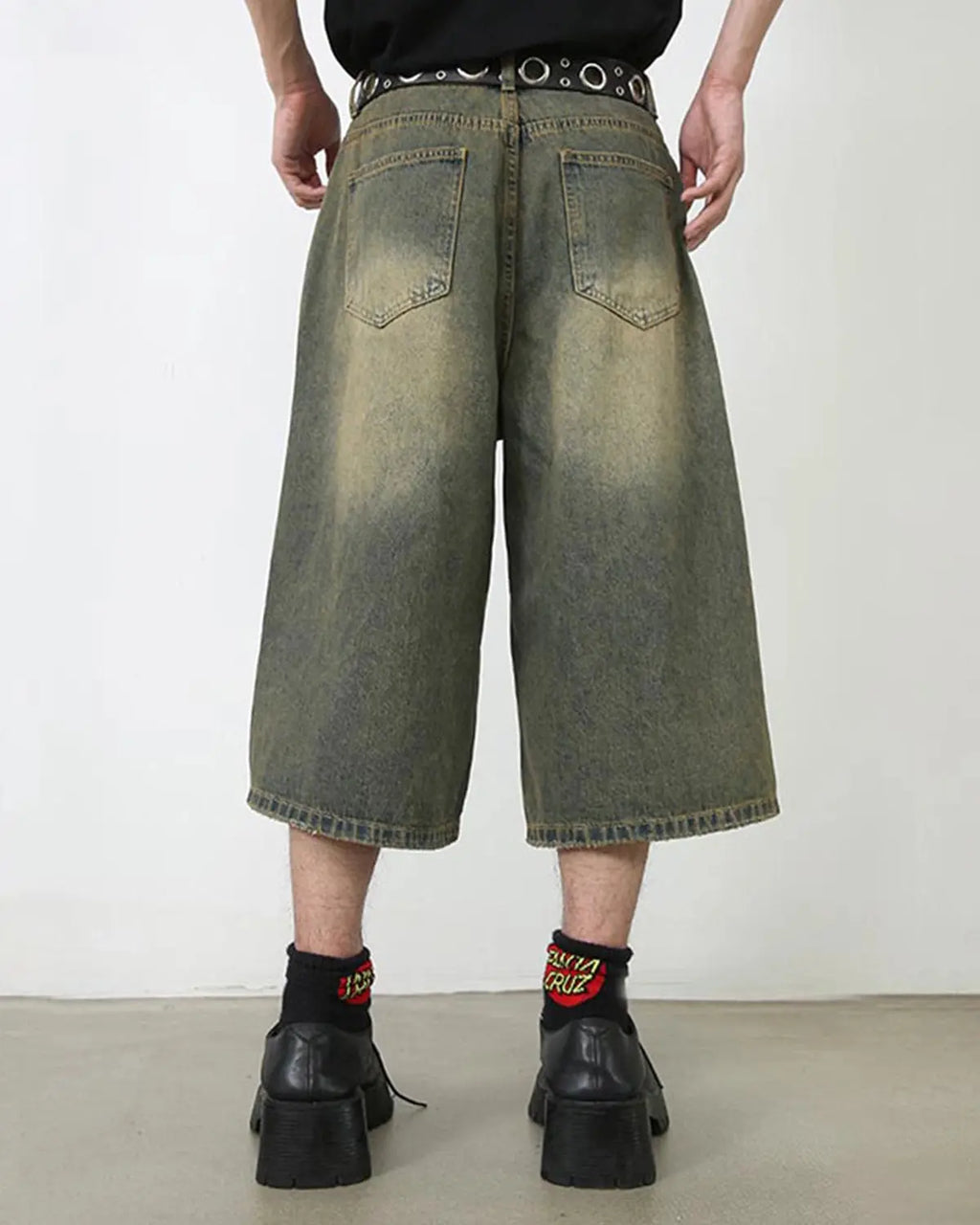 Inflation brand Baggy Jumbo Jorts, oversized denim shorts with a relaxed fit, shown on a model for streetwear style.