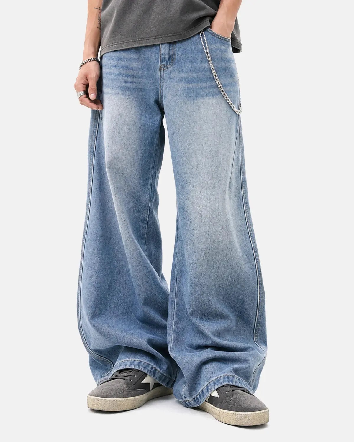 Star Pocket Bootcut Jeans by INFLATION, featuring classic denim with star-shaped pockets and a relaxed bootcut fit.