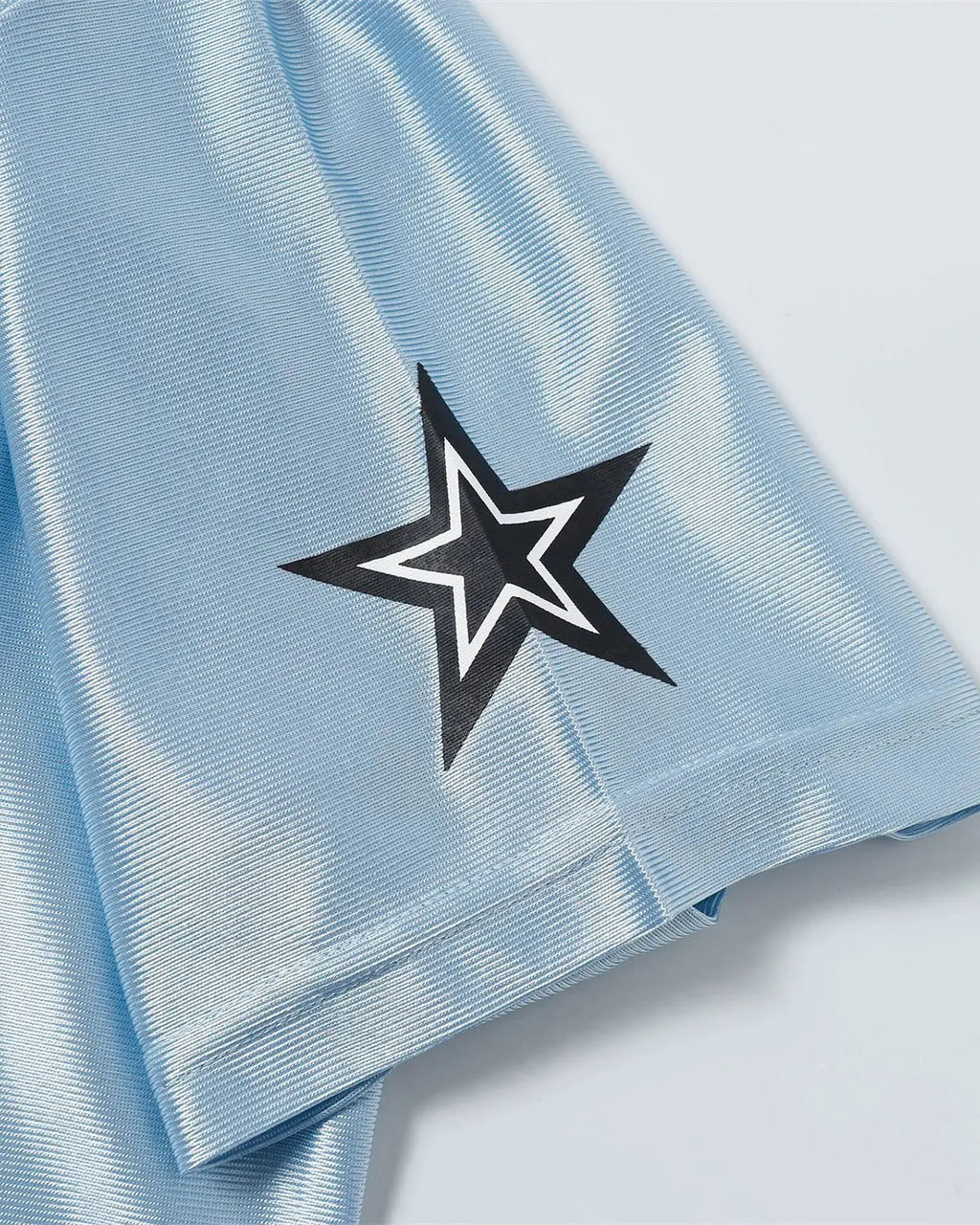 Oversized mesh patchwork jersey from Inflation Streetwear featuring a bold, colorful design and relaxed fit.