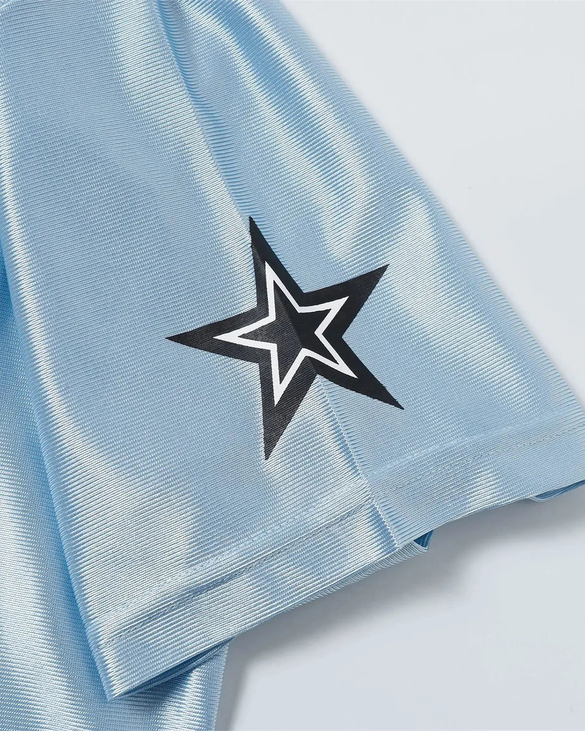Oversized mesh patchwork jersey from Inflation Streetwear featuring a bold, colorful design and relaxed fit.