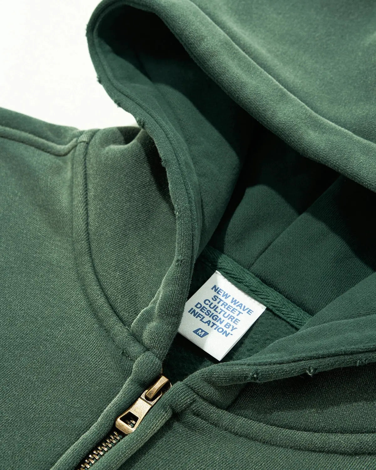 Green Monkey Wash Zip Up Hoodie from INFLATION Streetwear featuring a front zipper, hoodie, and vibrant green color.
