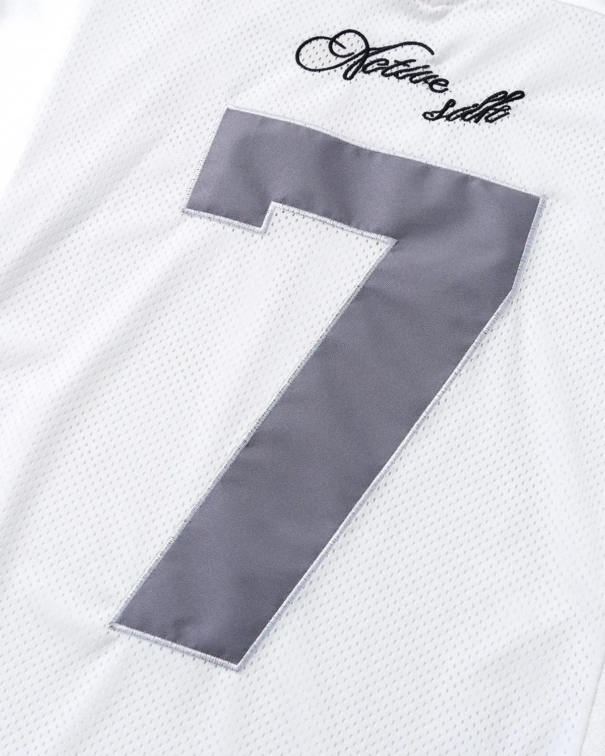 Mesh patchwork number jersey by INFLATION, featuring a stylish streetwear design with bold mesh and patchwork details.