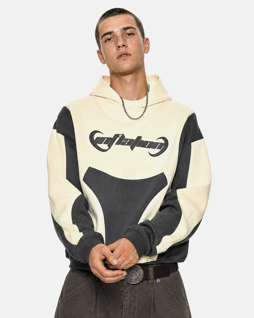 Inflation Streetwear patchwork puff print hoodie with colorful geometric patterns and a relaxed fit.