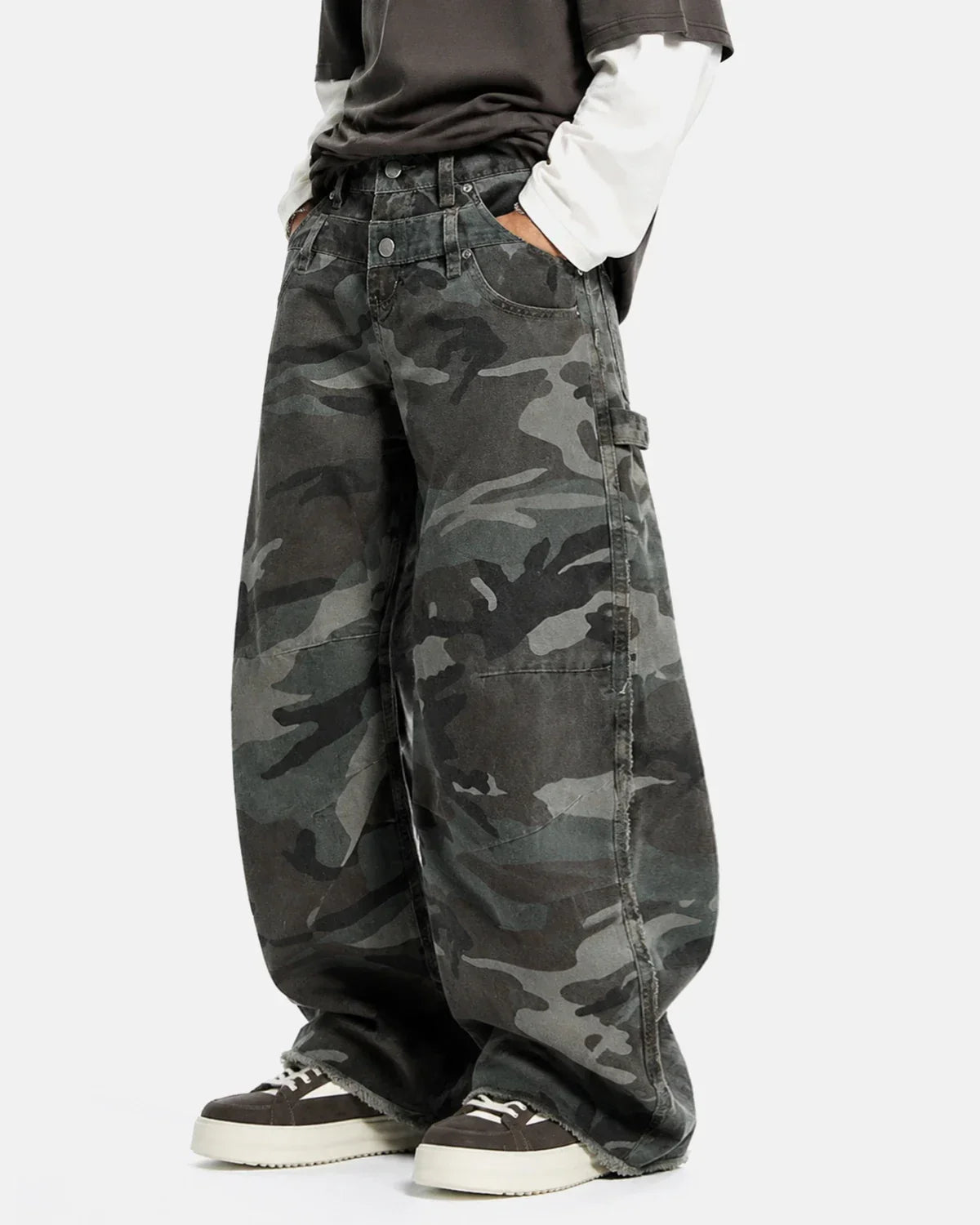 Inflation Streetwear double waist camo cargo pants with multiple pockets and relaxed fit, featuring green and brown camouflage pattern.